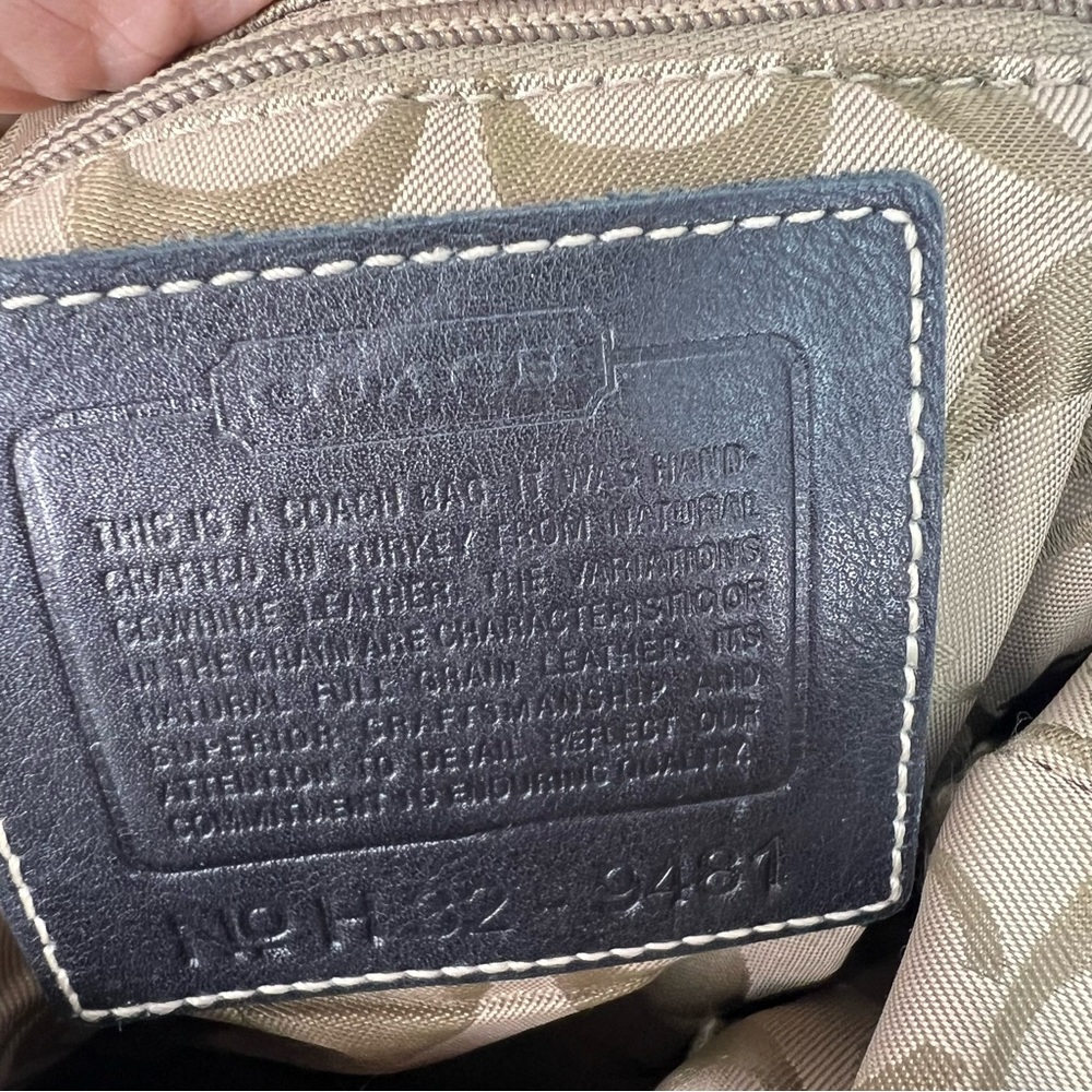 Coach black leather shoulder bag with adjustable strap and silver hardware. - Picture 7 of 11